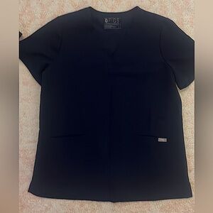 Size large FIGS navy blue scrub top. Barely worn. Excellent condition.